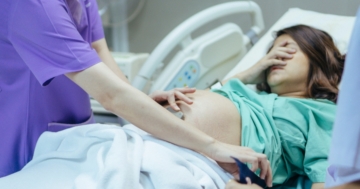 Dolore di una donna durante il parto